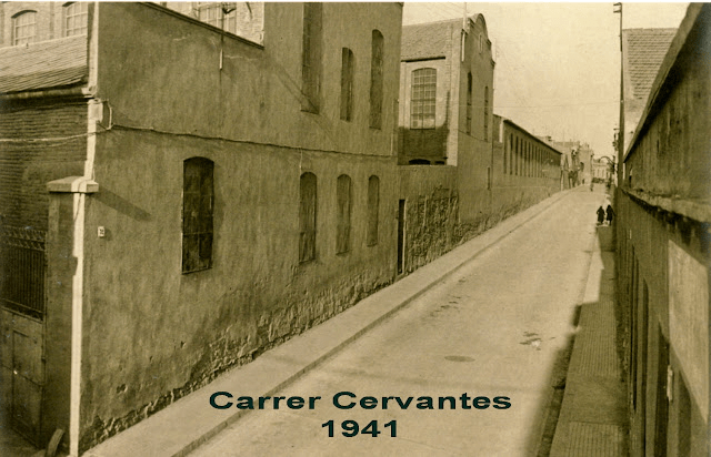 Carrer de Cervantes de Terrassa l’any 1941, amb les antigues façanes industrials de la via